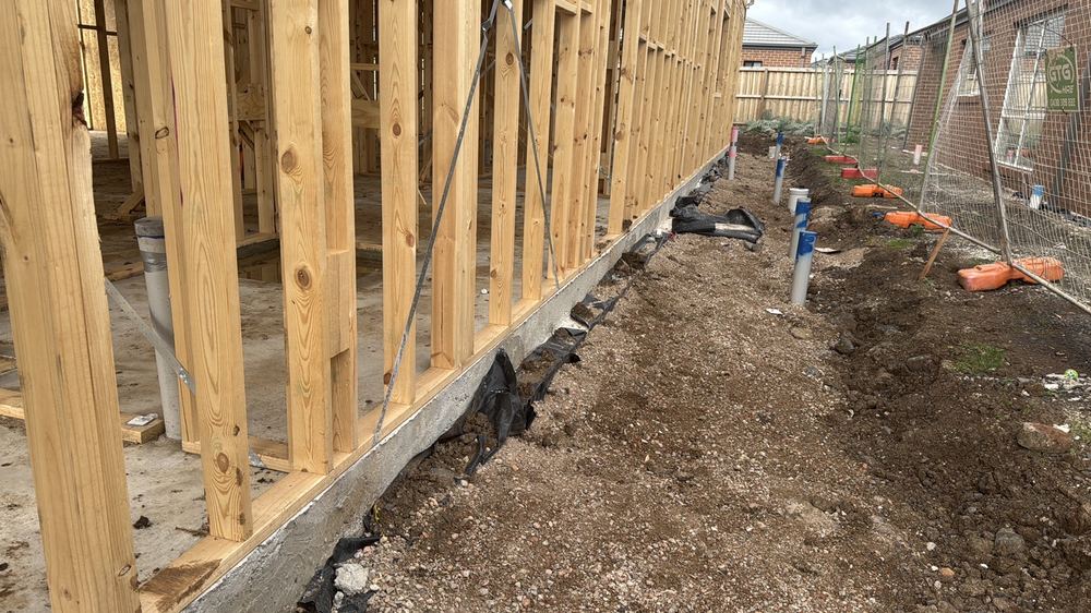 No physical termite barrier under the external walls at the frame visit, found during a frame inspection in Mambourin