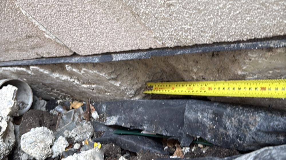 Broken section of the garage slab edge, found during a defect investigation in Herne Hill