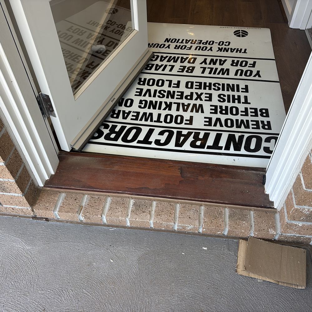 No flashing installed under the timber door sill, Mambourin