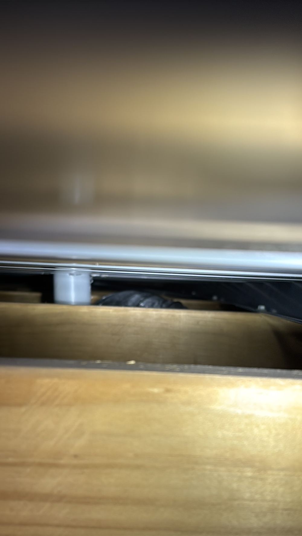 Bathroom exhaust duct not connected to its roof cowl, so moist air stays in the roof, found during a pre-handover inspection in Mambourin