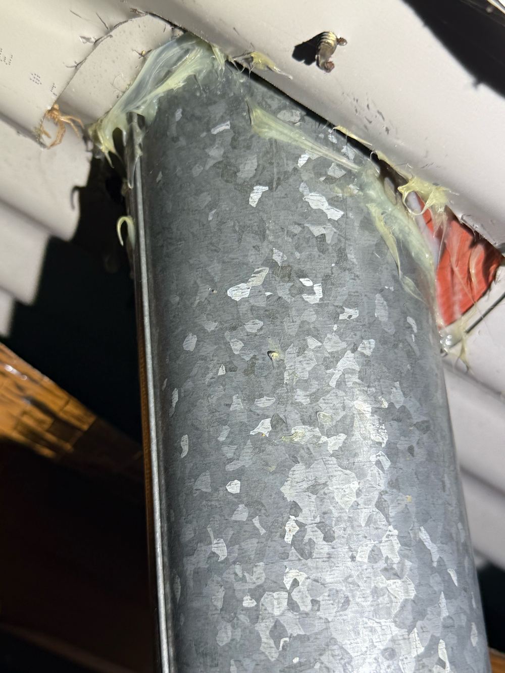 Daylight visible through a silicone seal, so the junction will not stay weathertight, found during a pre-purchase inspection in Newport